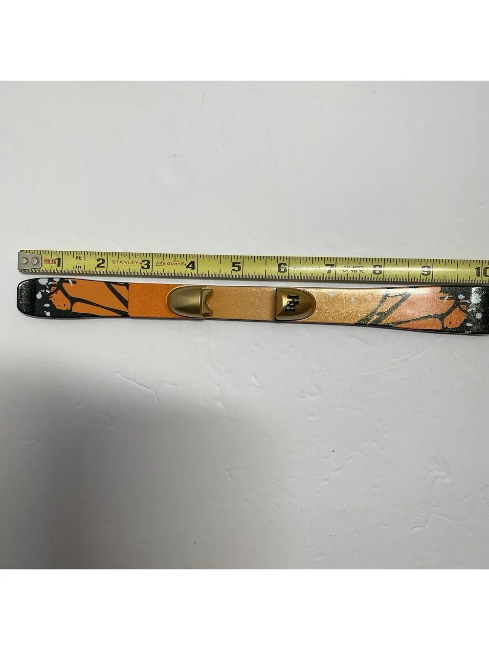 MGA Rainbow High Poppy Doll Skis Orange Monarch Butterfly